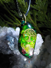 Arbre de vie, grenat, péridot.